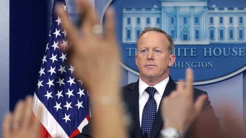 Sean Spicer at white house briefing room podium