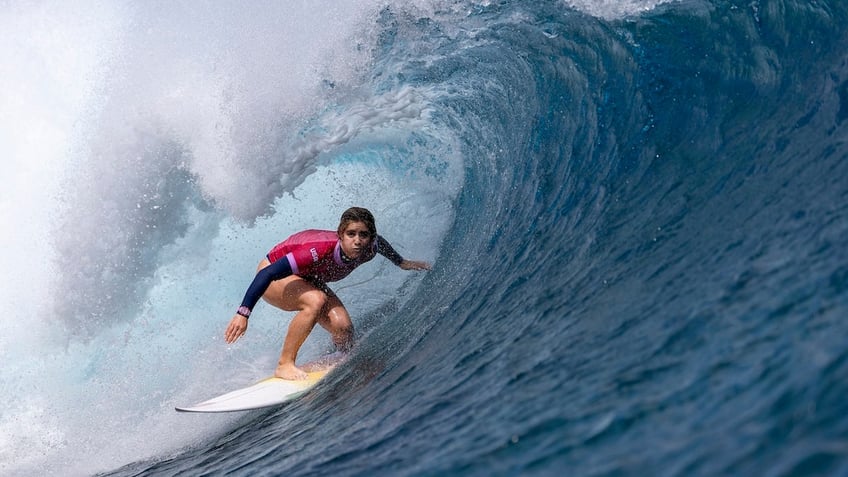 Caroline Marks rides a wave.