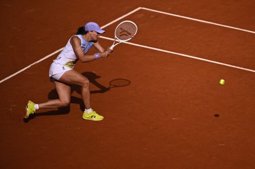 Iga Swiatek stormed through the second round of Roland Garros with a convincing win agains