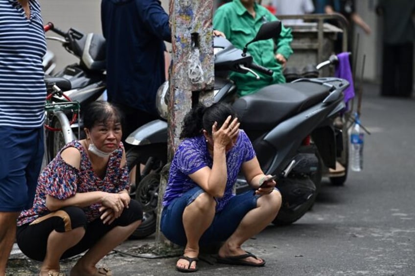 whole family gone families identify victims of hanoi fire