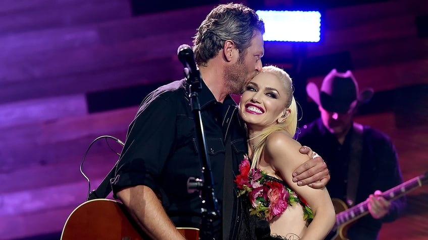 Blake Shelton and Gwen Stefani Embracing