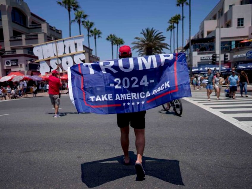 People rally in support of Republican presidential candidate former President Donald Trump