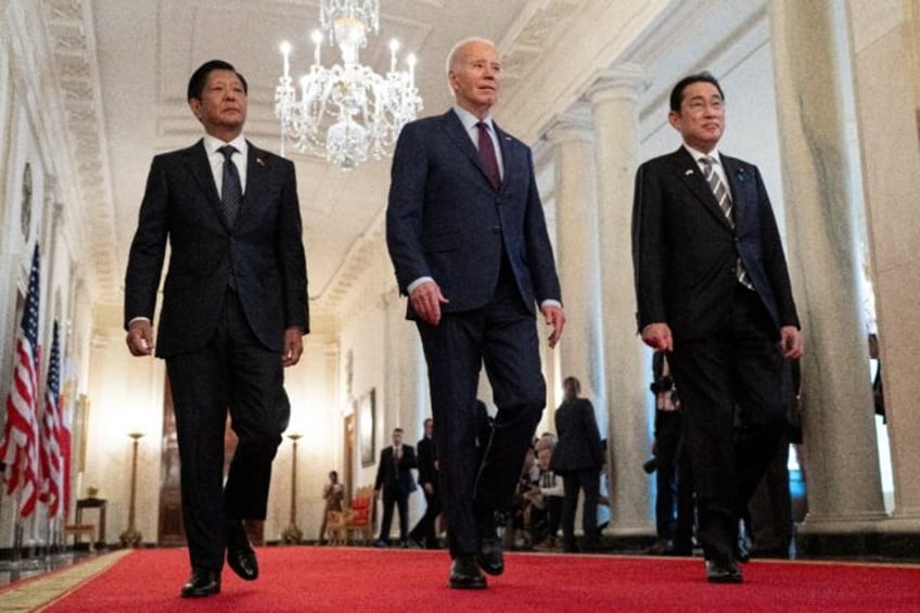 Philippine President Ferdidand Marcos (L), US President Joe Biden (C) and Japanese Prime M