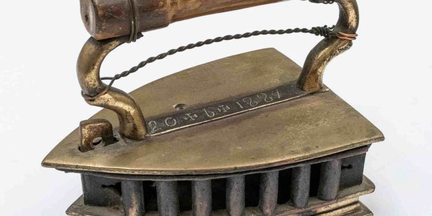 wife to auction off husbands collection of 400 vintage irons brought him joy