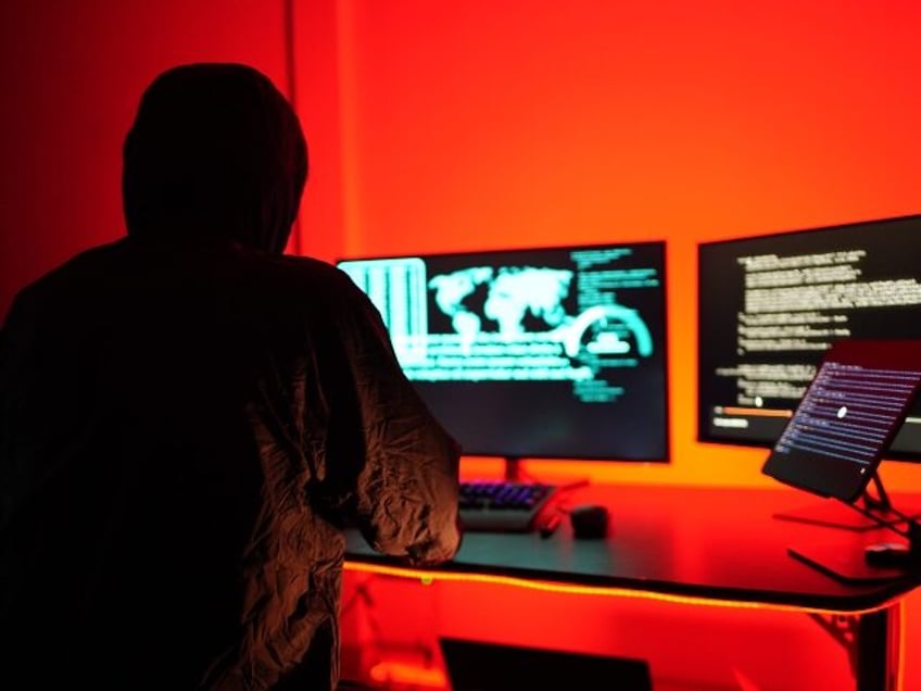 hacker at his workstation