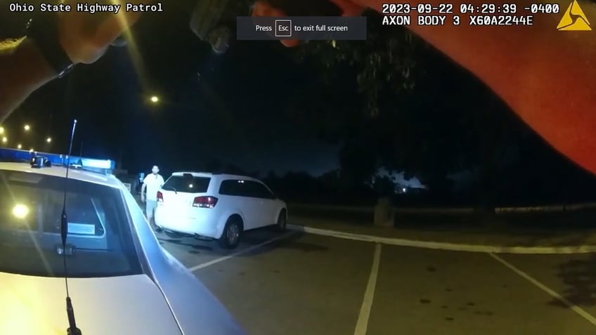 wild bodycam footage of fugitive daring cops to shoot him before high speed chase