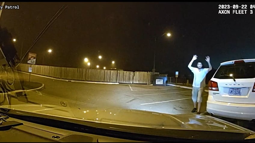 wild bodycam footage of fugitive daring cops to shoot him before high speed chase