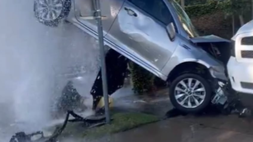 California hydrant bursts after crash