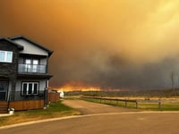 Wildfire closes in on Canadian oil sands city