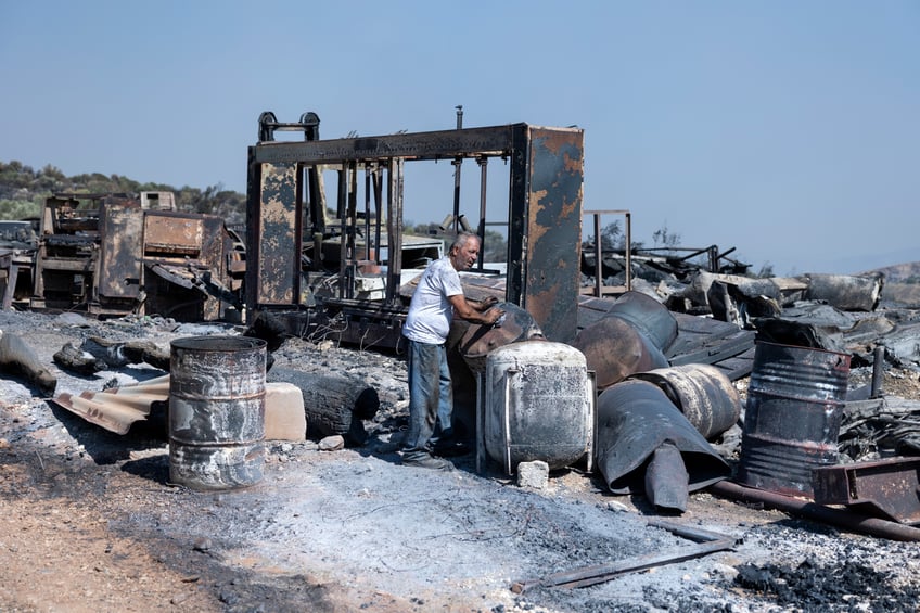 wildfires continue to rage in greece authorities announce evacuations