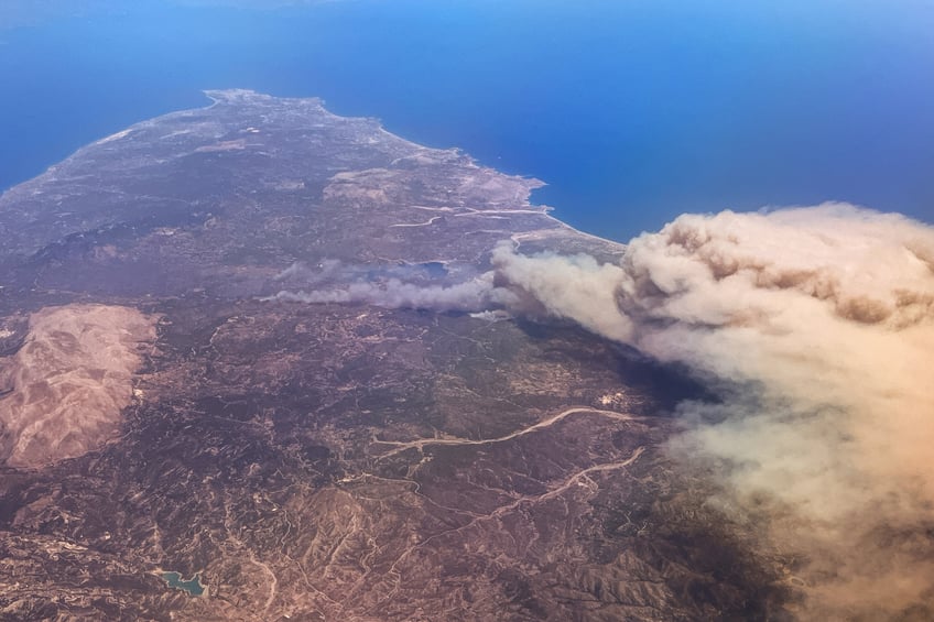 wildfires continue to rage in greece authorities announce evacuations