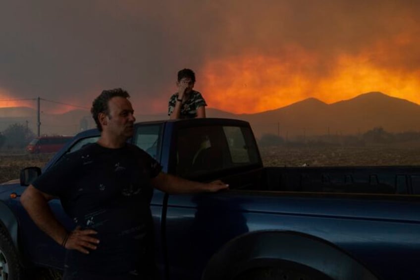 wildfires torment greece california digs out from hilary what to know in extreme weather now