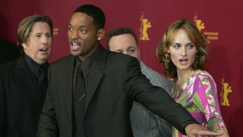 Will Smith posing with the cast of "Hitch."