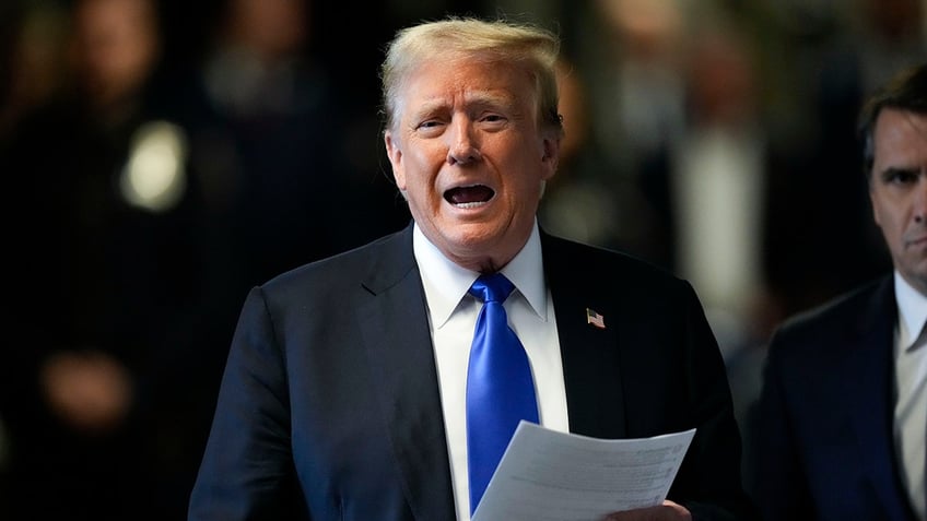 Donald Trump speaks to members of the media at Manhattan Criminal Court