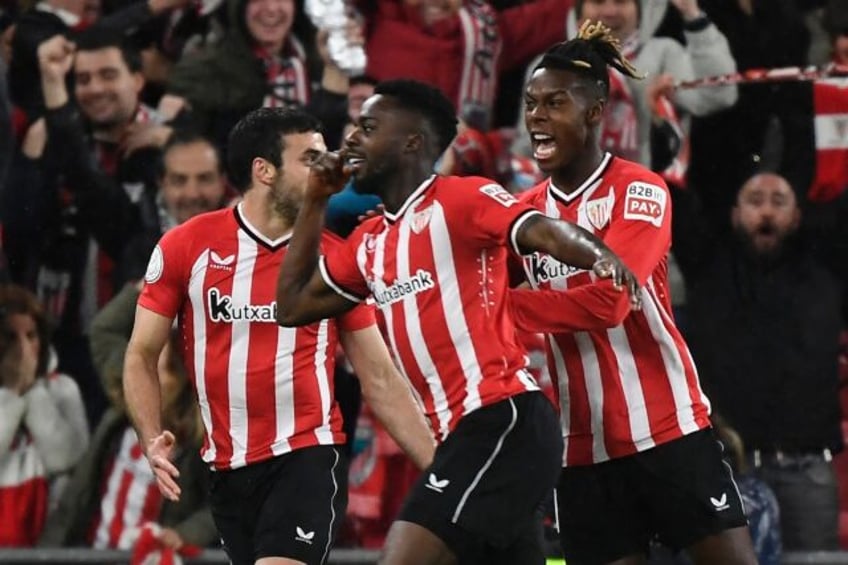 Inaki Williams (centre) put Bilbao ahead with a little help from his brother Nico (right)