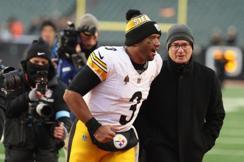 Pittsburgh quarterback Russell Wilson celebrates after the Steelers' NFL victory over the