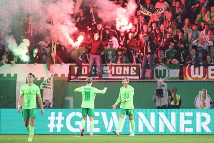 Jonas Wind (R), seen here celebrating his goal in Wolfsburg's German Cup tie against Borus