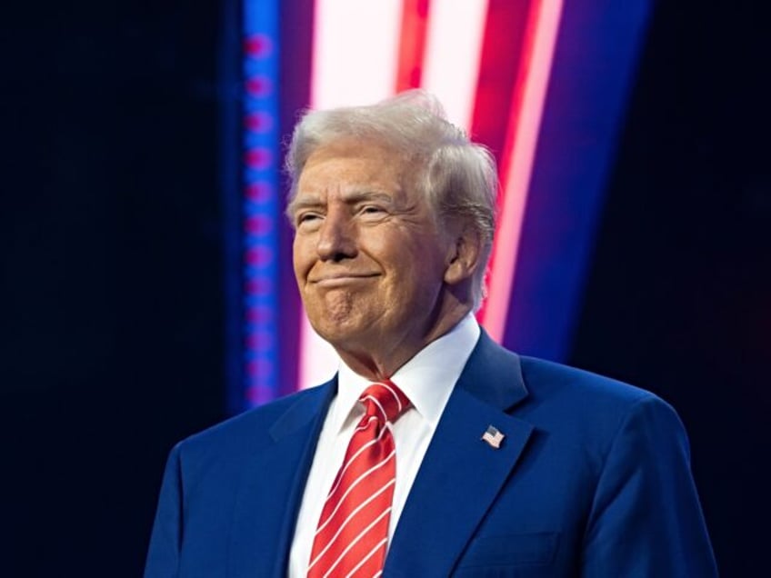 PHOENIX, ARIZONA - DECEMBER 22: U.S. President-elect Donald Trump smiles during Turning Po
