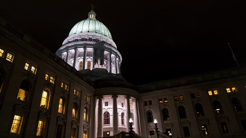 wisconsin man arrested for bringing handgun in capitol returns hours later with assault rifle