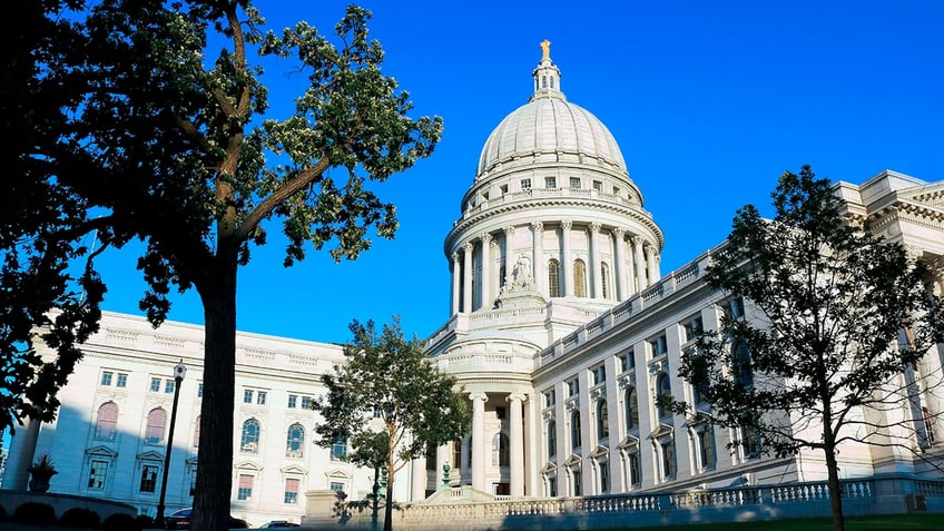 wisconsin man arrested for bringing handgun in capitol returns hours later with assault rifle