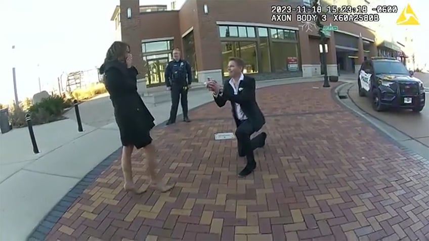 wisconsin police help man stage marriage proposal in heartwarming bodycam video