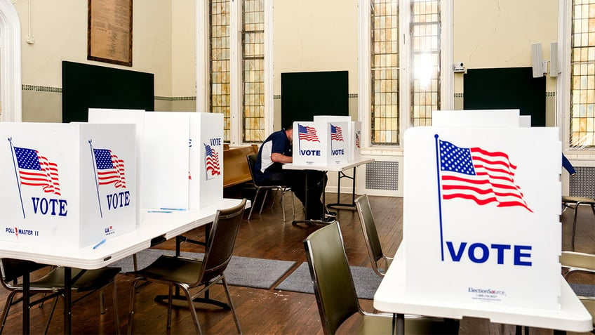 Voters casting their ballots.