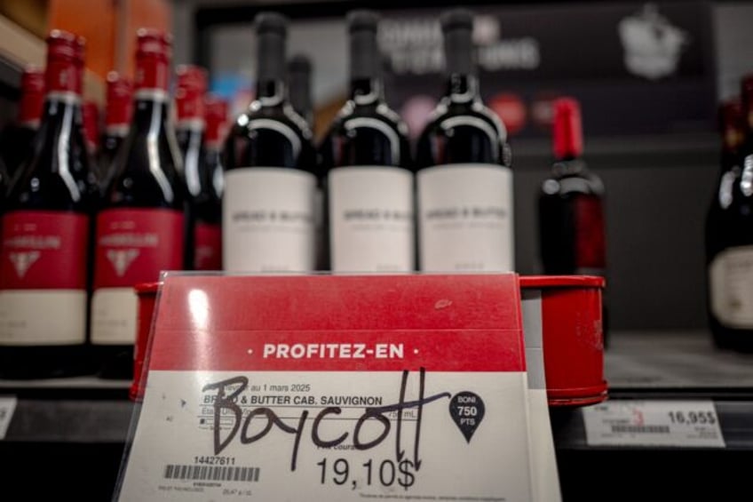 Graffiti calling to boycott American wine is seen at a liquor store in Montreal, Canada, o