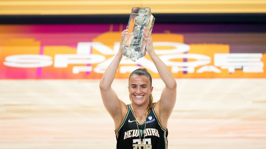 Sabrina Ionescu of the New York Liberty celebrates after winning the WNBA Starry 3-Point Contest on July 18, 2025 at Gainbridge Fieldhouse in Indianapolis, Indiana.