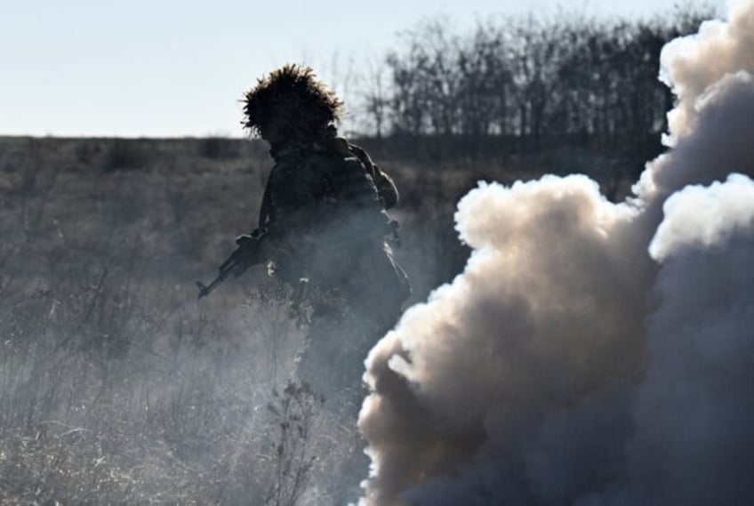 A serviceman of Ukraine's Alkatraz special rifle battalion takes part in a military drill