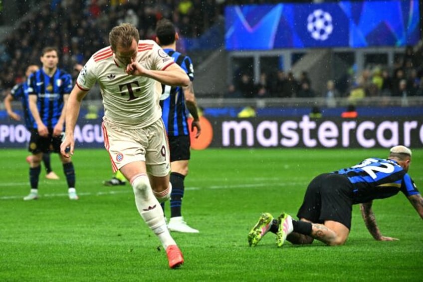 Bayern Munich forward Harry Kane celebrates after scoring against Inter Milan. Kane won hi