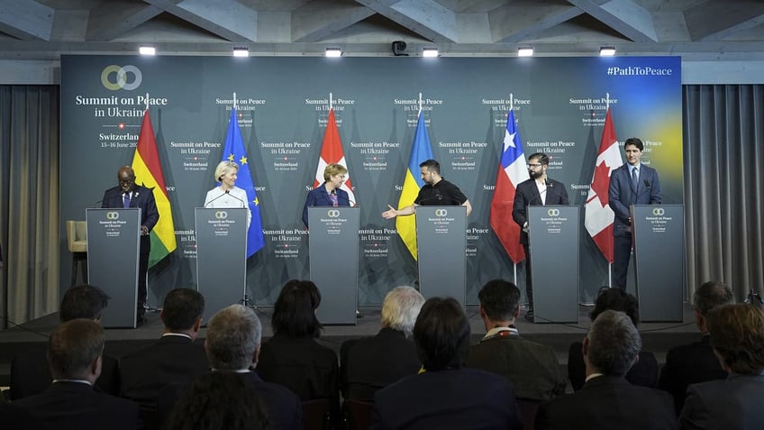 Ukrainian President Volodymyr Zelenskyy, center right, shakes hands with Swiss Federal President Viola Amherd during the closing press conference of the Ukraine peace summit in Obbürgen, Switzerland, on Sunday, June 16, 2024. Switzerland is hosting scores of world leaders this weekend to try to map out the first steps toward peace in Ukraine.