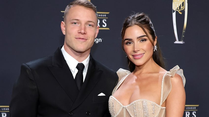 Christian McCaffrey and Olivia Culpo