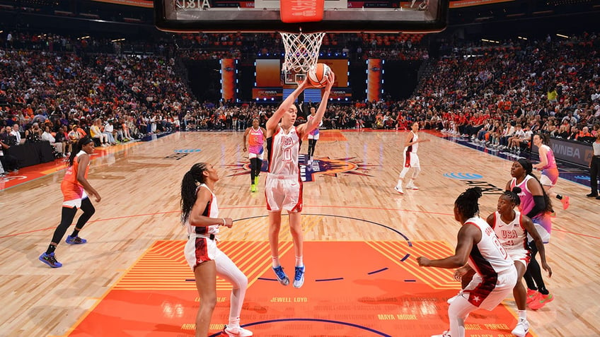 Breanna Stewart gets the rebound