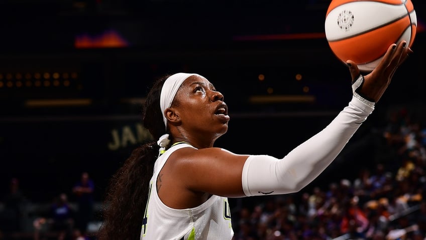 Arike Ogunbowale with the basketball