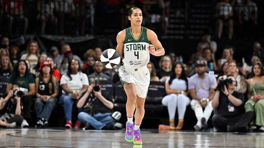 Skylar Diggins-Smith dribbles during a game