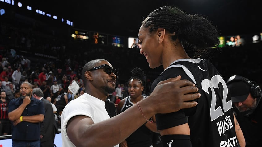 Usher speaks with WNBA star A'ja Wilson