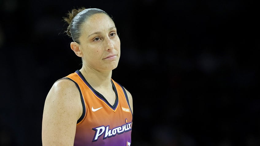 Diana Taurasi looks on