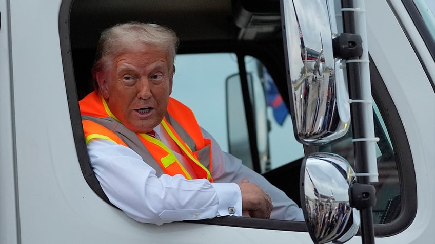 Trump in a garbage truck