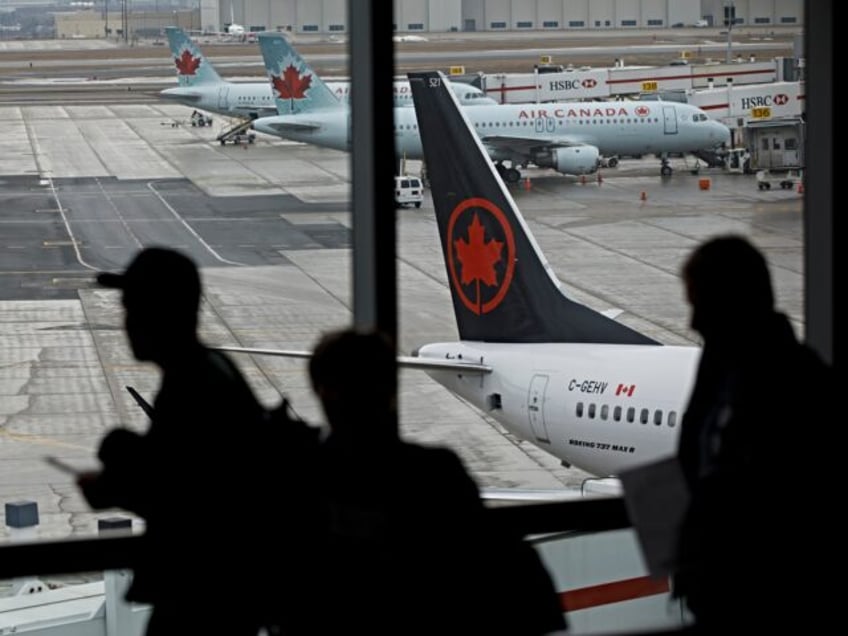 TORONTO, ON - MARCH 13: The tail of a grounded Air Canada Boeing 747 MAX 8 is seen at Toro