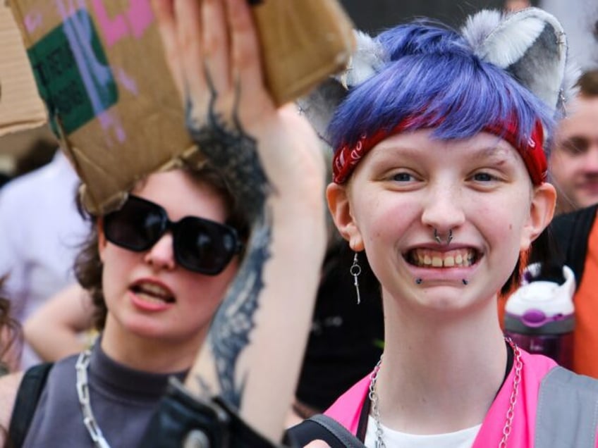 LONDON, UNITED KINGDOM - AUG 03, 2024 - Protesters take part in a trans rights protest mar