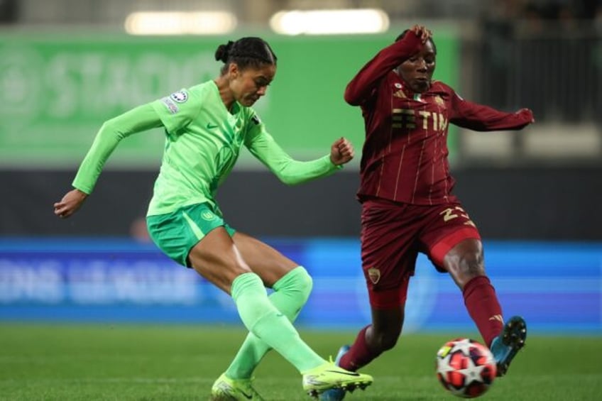 Sveindis Jonsdottir (L) scored four as Wolfsburg thrashed Roma