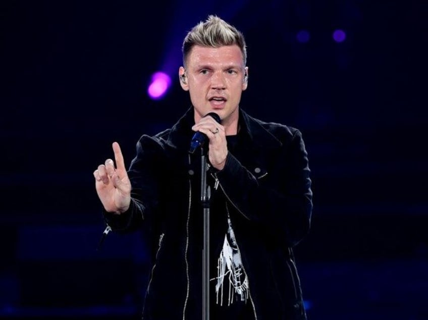 woman accuses backstreet boys nick carter of raping her at age 15 singers lawyers say police determined claim was false in 2003