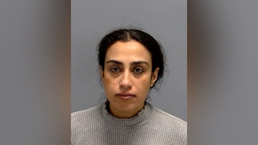 woman arrested for allegedly crashing car into indianapolis jewish school with people inside police
