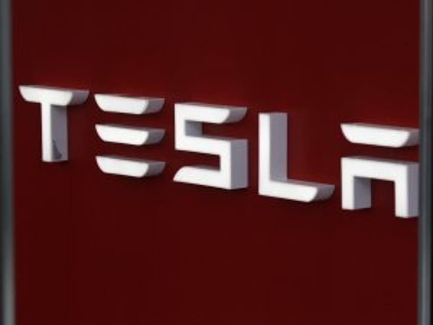 Woman arrested for vandalizing Colorado Tesla dealership