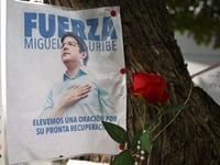 Woman arrested over alleged links to Colombia presidential candidate shooting
