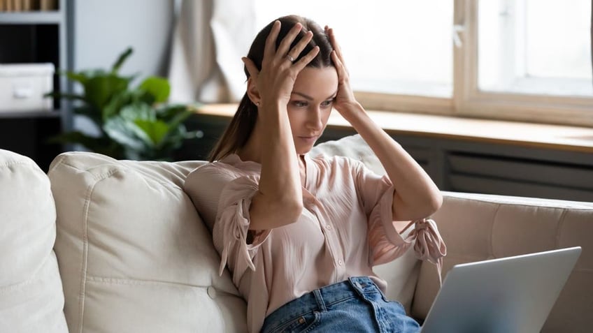 Frustration on her laptop