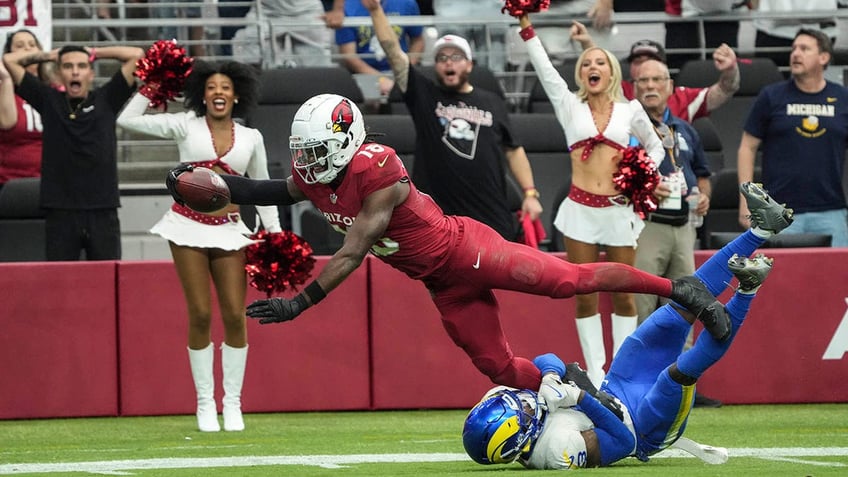 Marvin Harrison Jr. lunges for endzone