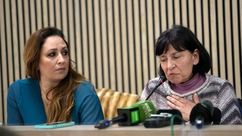 Lawyer Laura Sgro listens to Gloria Branciani