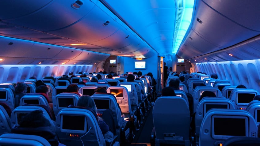 Inside of airplane, dark setting