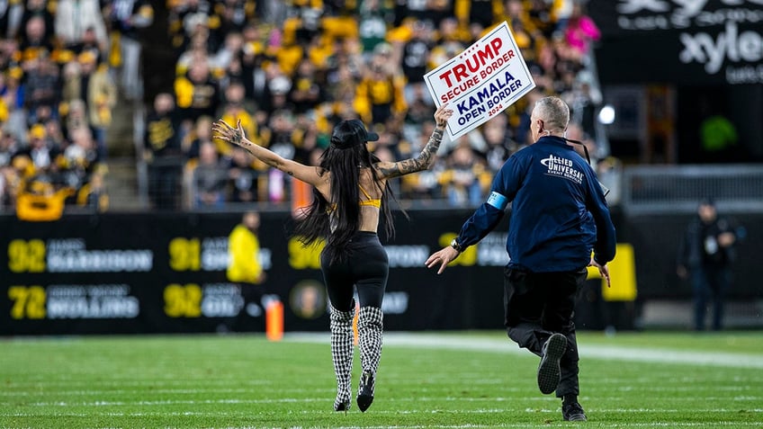 Woman with trump sign